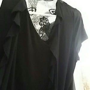 A black sweet trapeze West medium size top